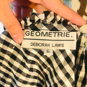 Checkered black and white crop wrap around top